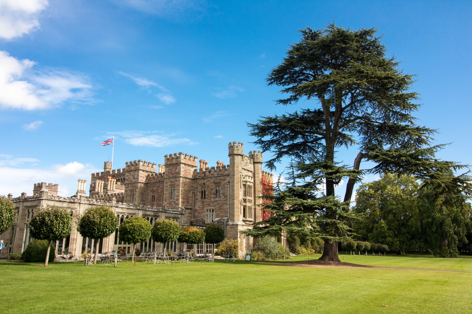 Hampton Court Castle and Gardens. Blue skies. Old British castle. Top 25 Things to Do in Herefordshire.