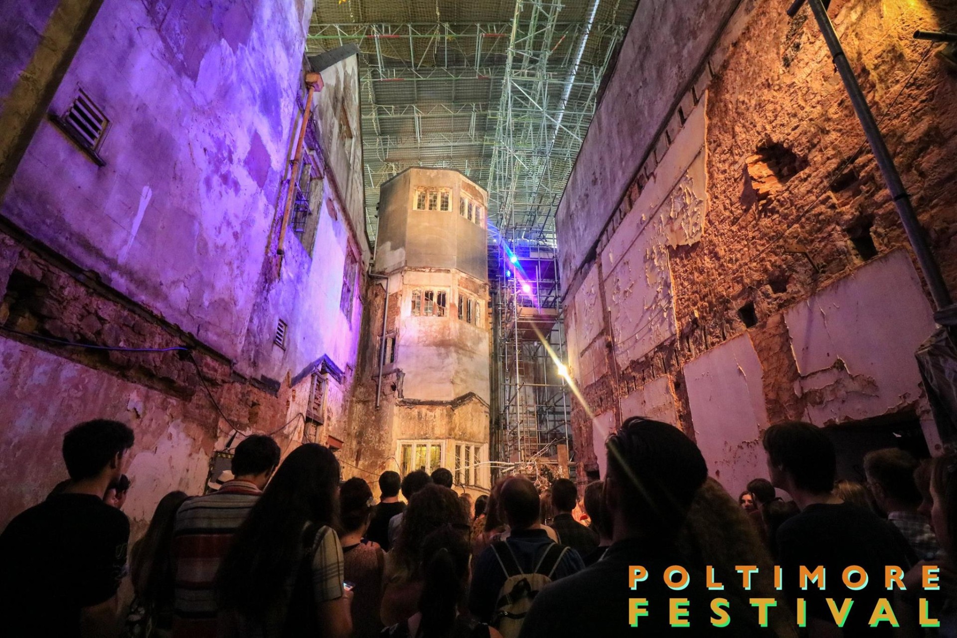 Poltimore Festival Exeter University Devon derelict building purple and orange lights crowd of people watching a gig concert live music How to Get Into Marketing with an English Degree