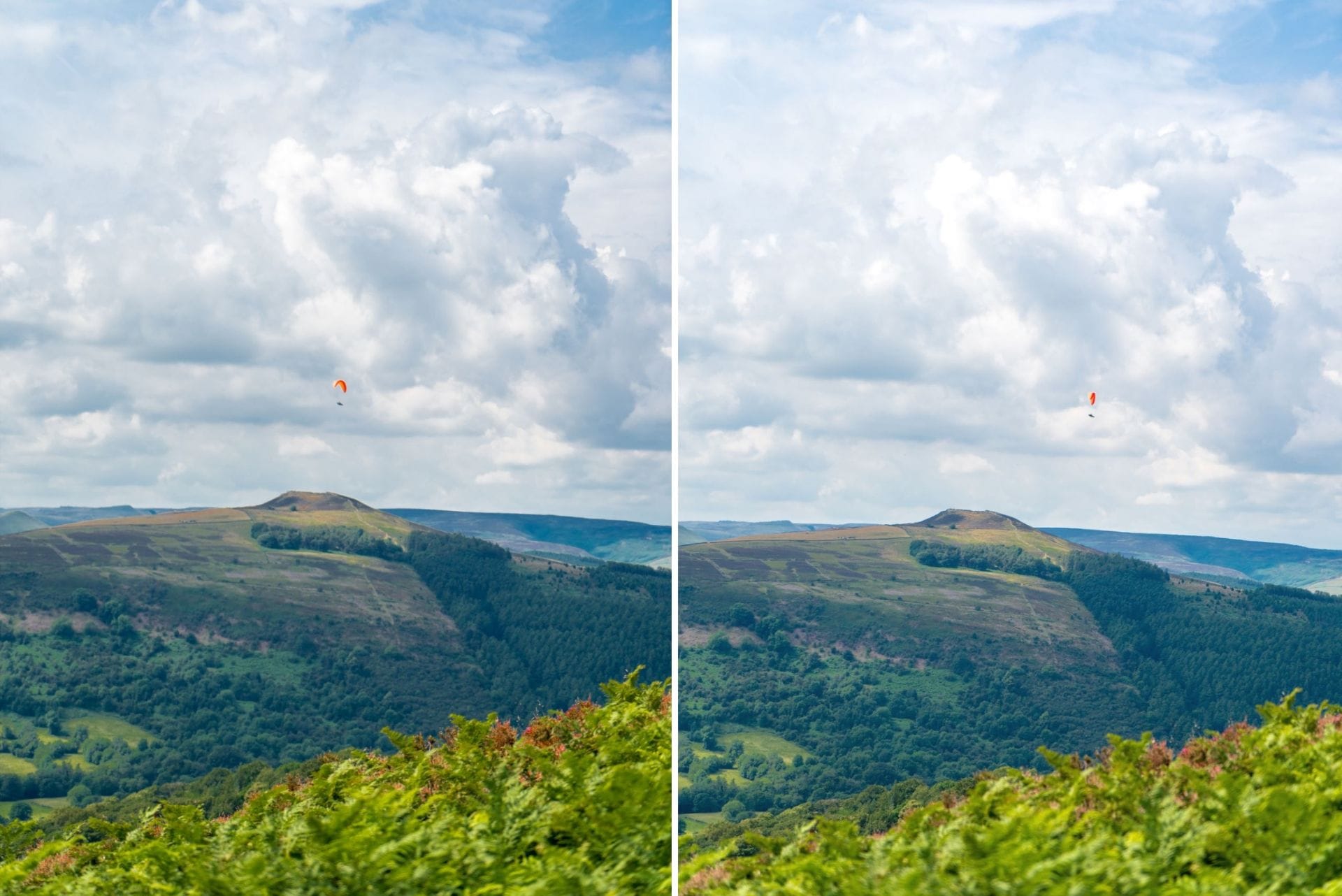 paraglider-flying-over-lush-green-hills