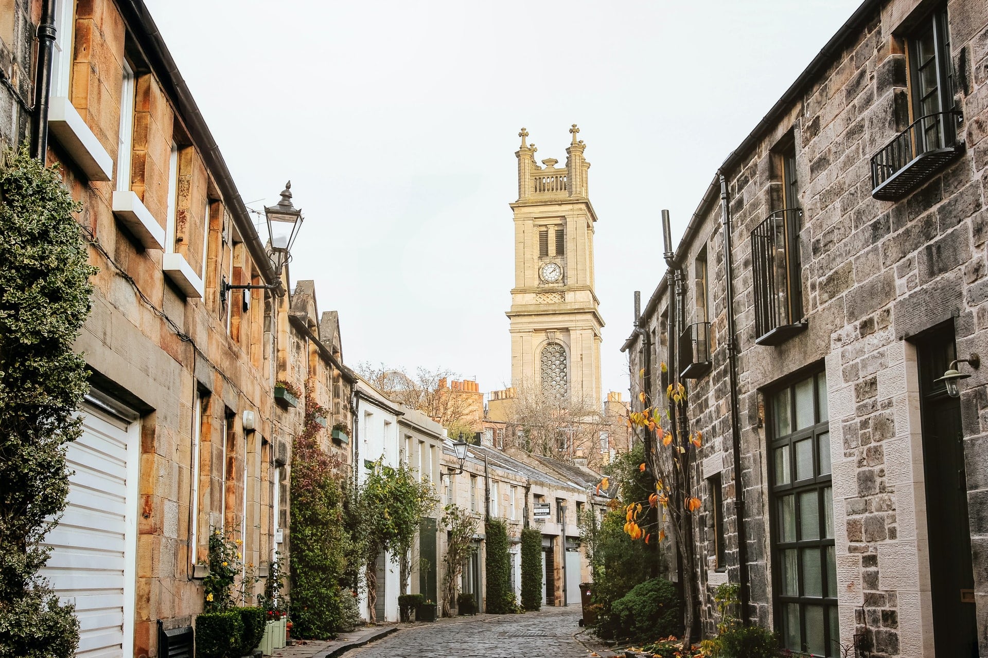 cute-lane-with-cobbled-floor-with-short-houses-on-either-side-leading-up-to-picturesque-tower-circus-lane-best-uk-city-breaks-for-couples