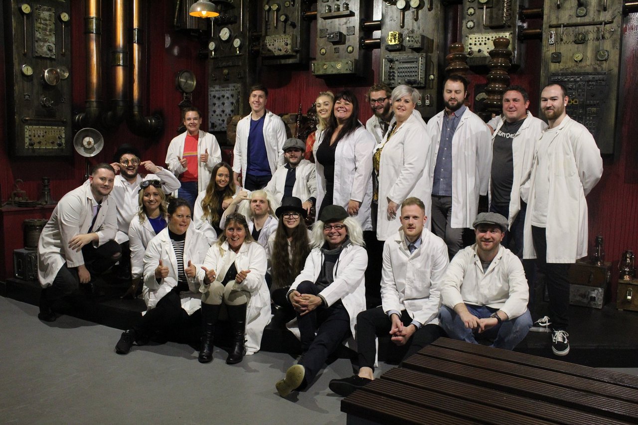 big-group-of-friends-in-white-lab-coats-at-locked-in-a-room-escape-rooms-southampton