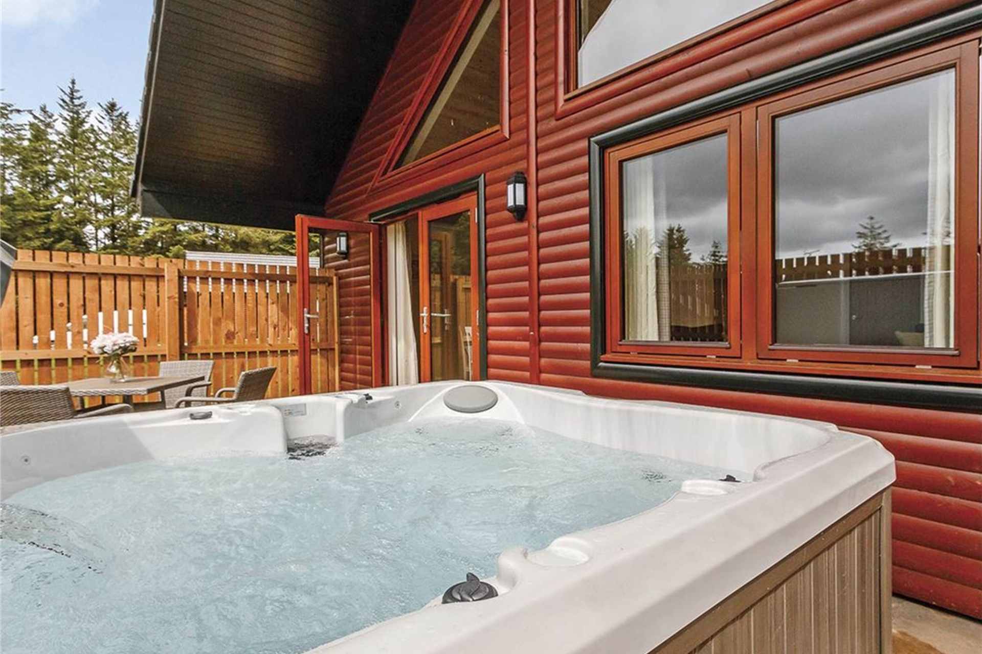 hot-tub-outside-red-galbraith-premier-spa-cabin