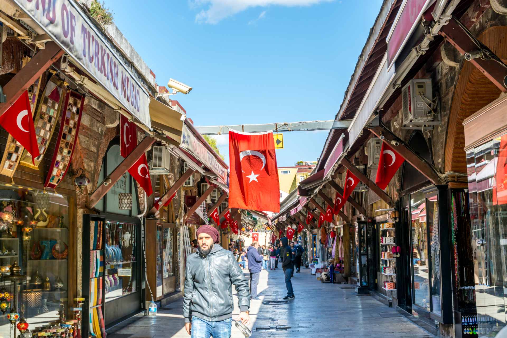 people-walking-down-turkish-street-lined-by-stalls-at-arasta-bazaar-istanbul-hidden-gems