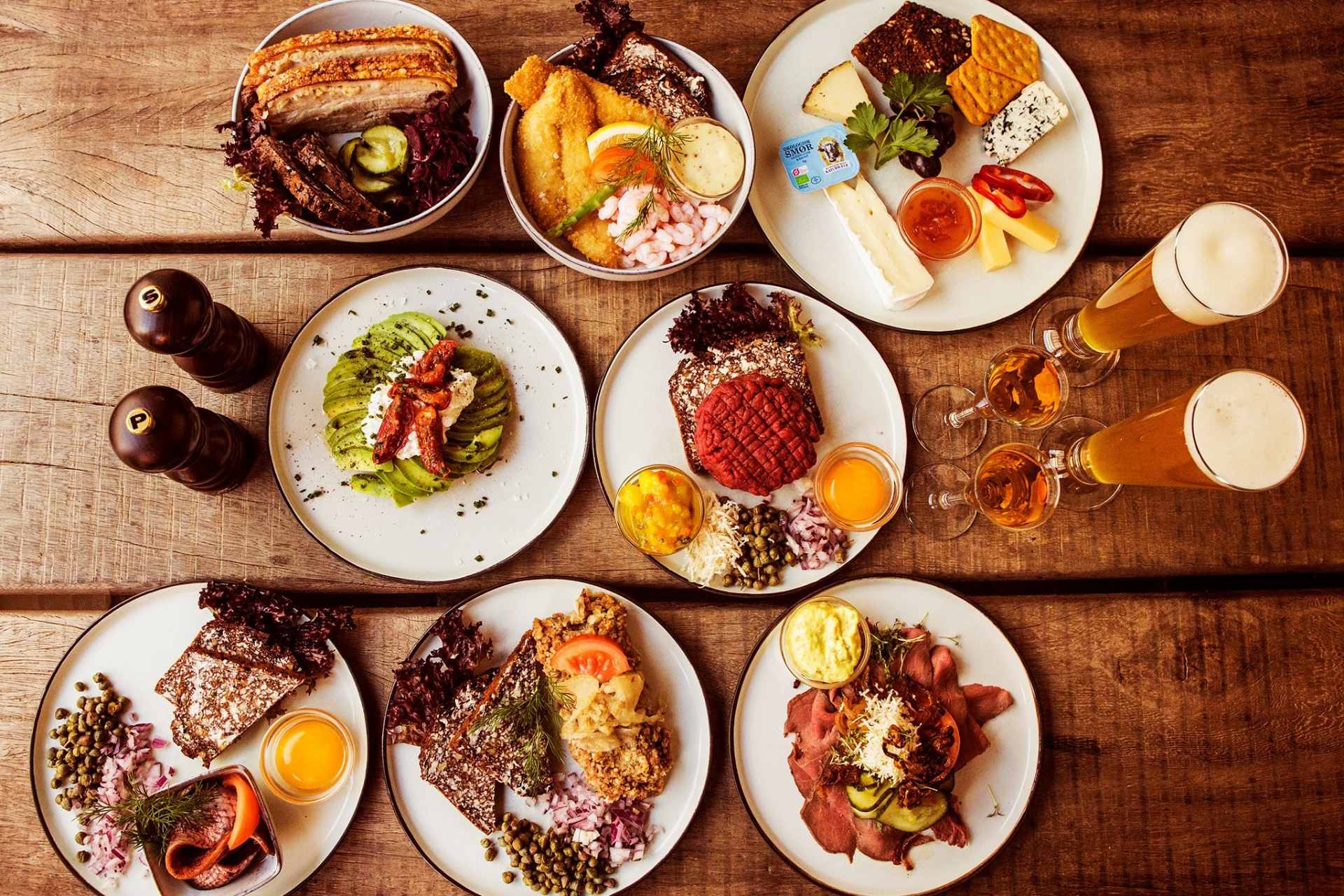 plates-of-food-on-wooden-table-at-restaurant-m-3-days-in-copenhagen-itinerary