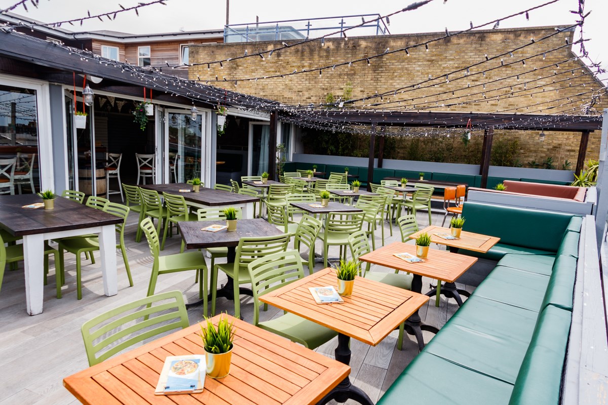 rooftop-sky-bar-with-restaurant-tables-at-revolution-bottomless-brunch-southampton
