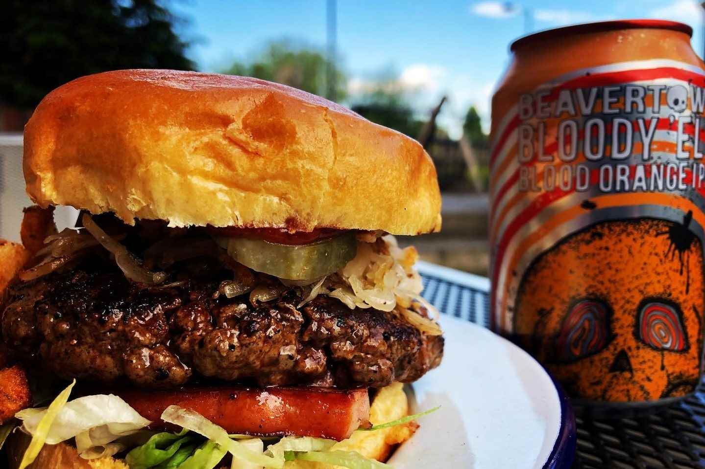 burger-on-plate-with-can-of-craft-beer-hide-burger-bar