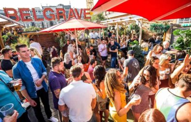crowds-of-people-drinking-on-rooftop-of-belgrave-music-hall-and-canteen-rooftop-bars-leeds