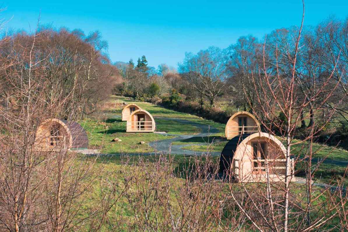 glendalough-glamping-pods-on-hill-on-sunny-day