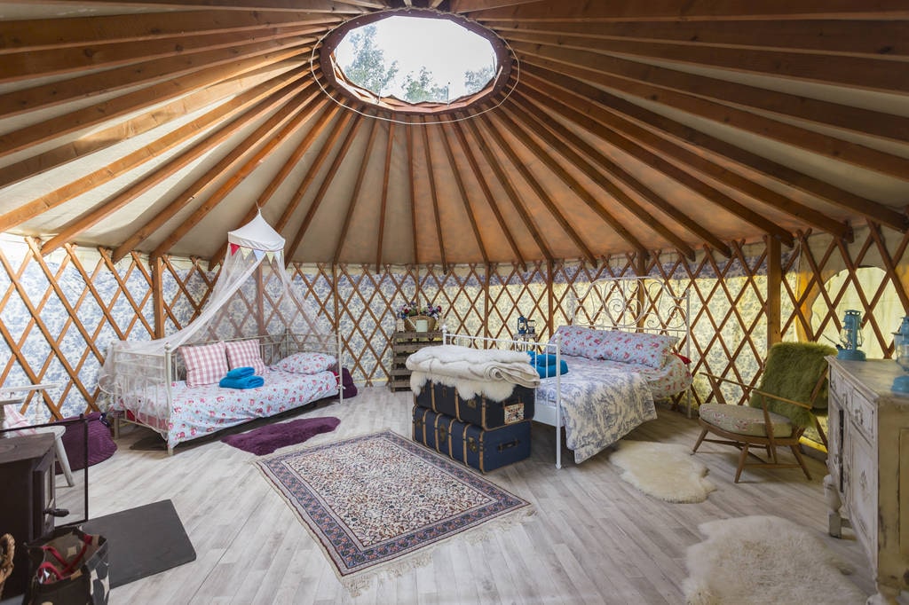 interior-of-bodichon-yurt-with-bed-at-glottenham-castle-glamping-sussex