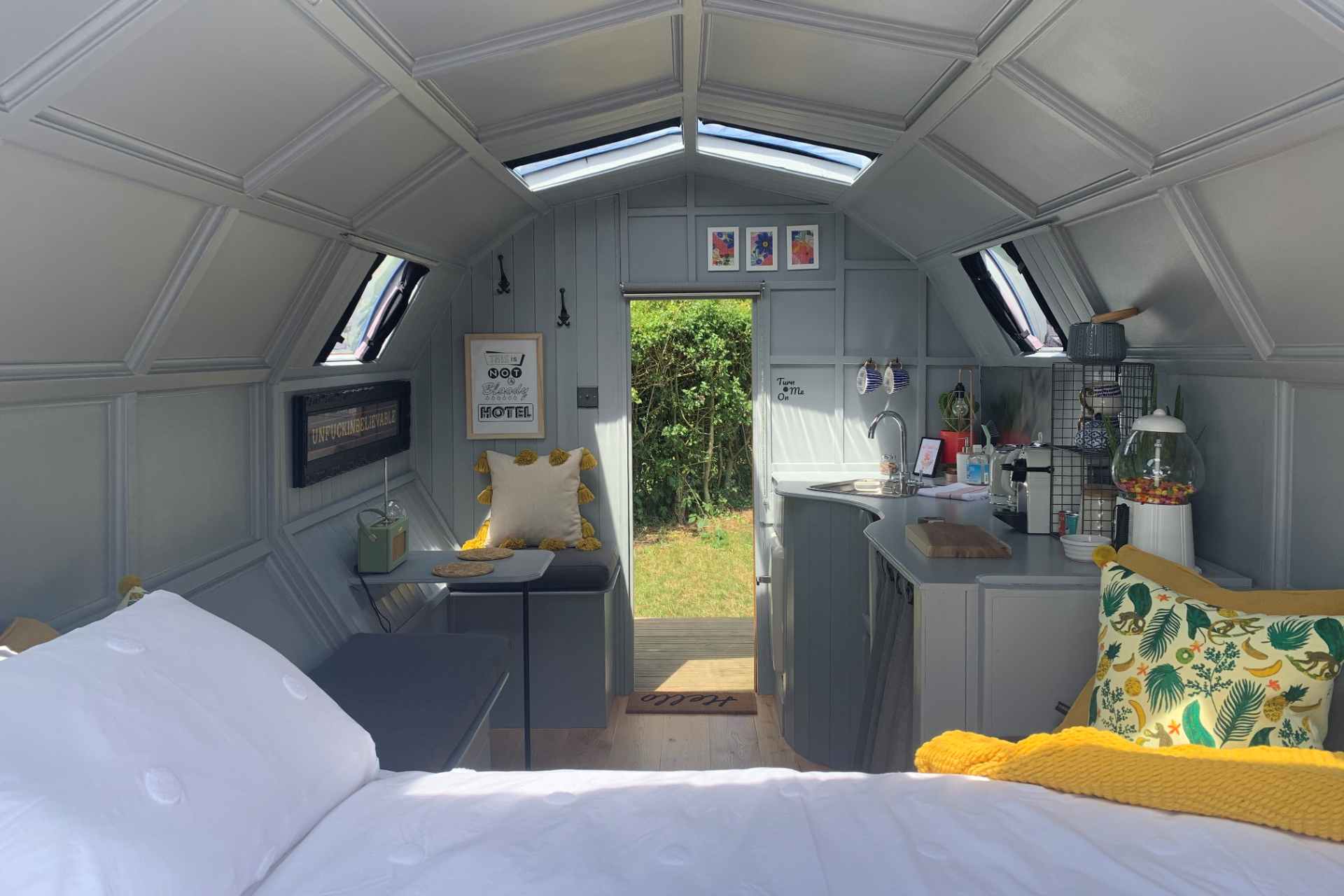 interior-of-wilderness-wagon-with-bed-and-kitchen