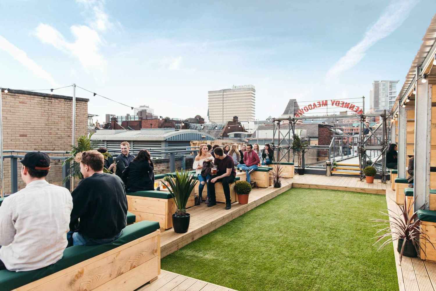 people-drinking-at-headrow-house-rooftop-bars-leeds