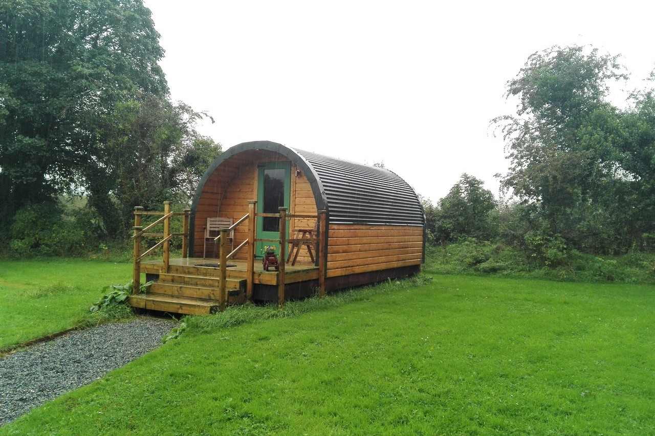 brown-carrigeen-glamping-pod-in-field