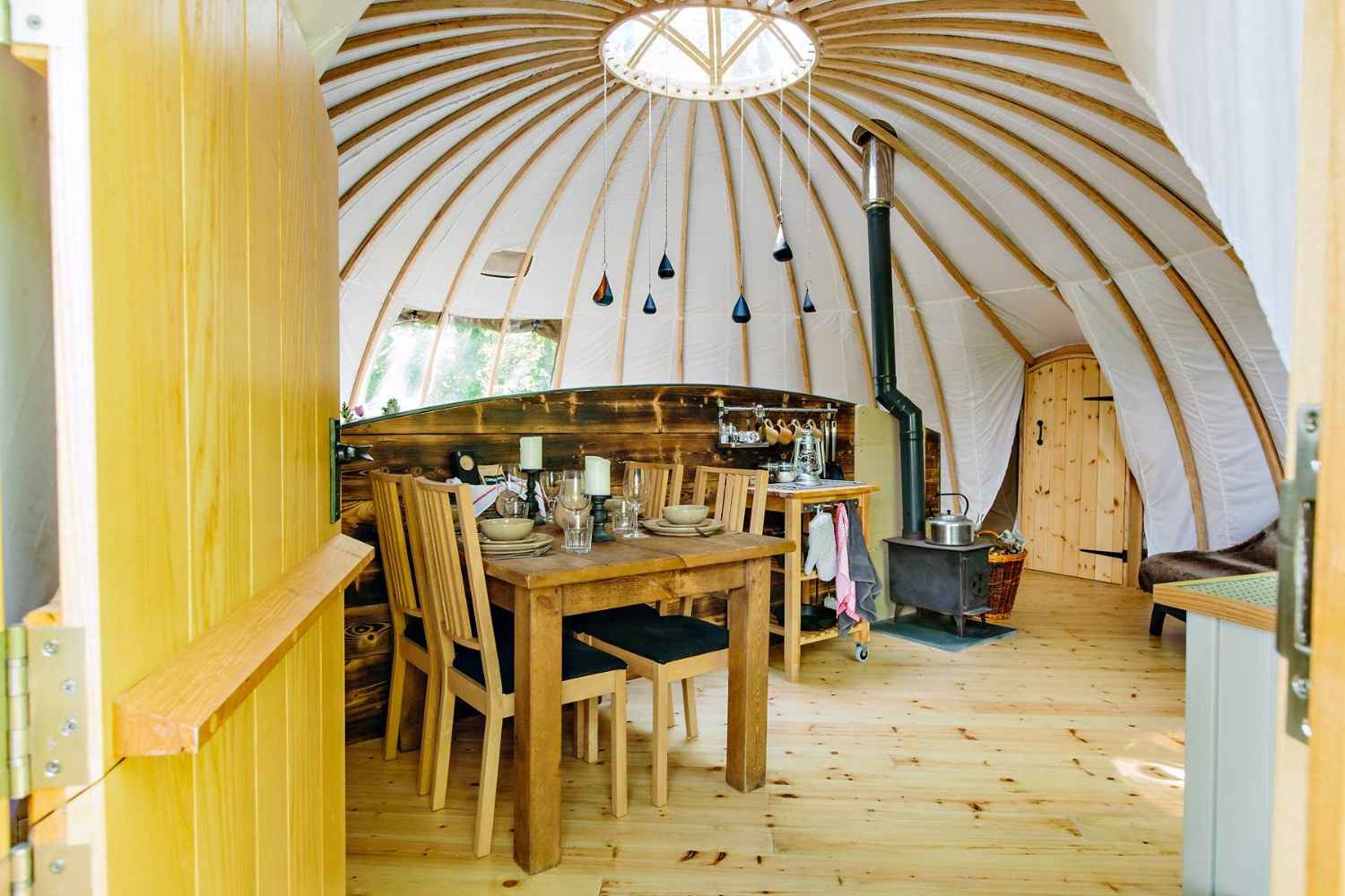 living-and-kitchen-area-inside-penhein-glamping-alachigh-tent-glamping-south-wales