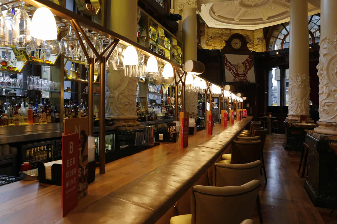 seats-at-bar-of-revolution-bar-and-restaurant