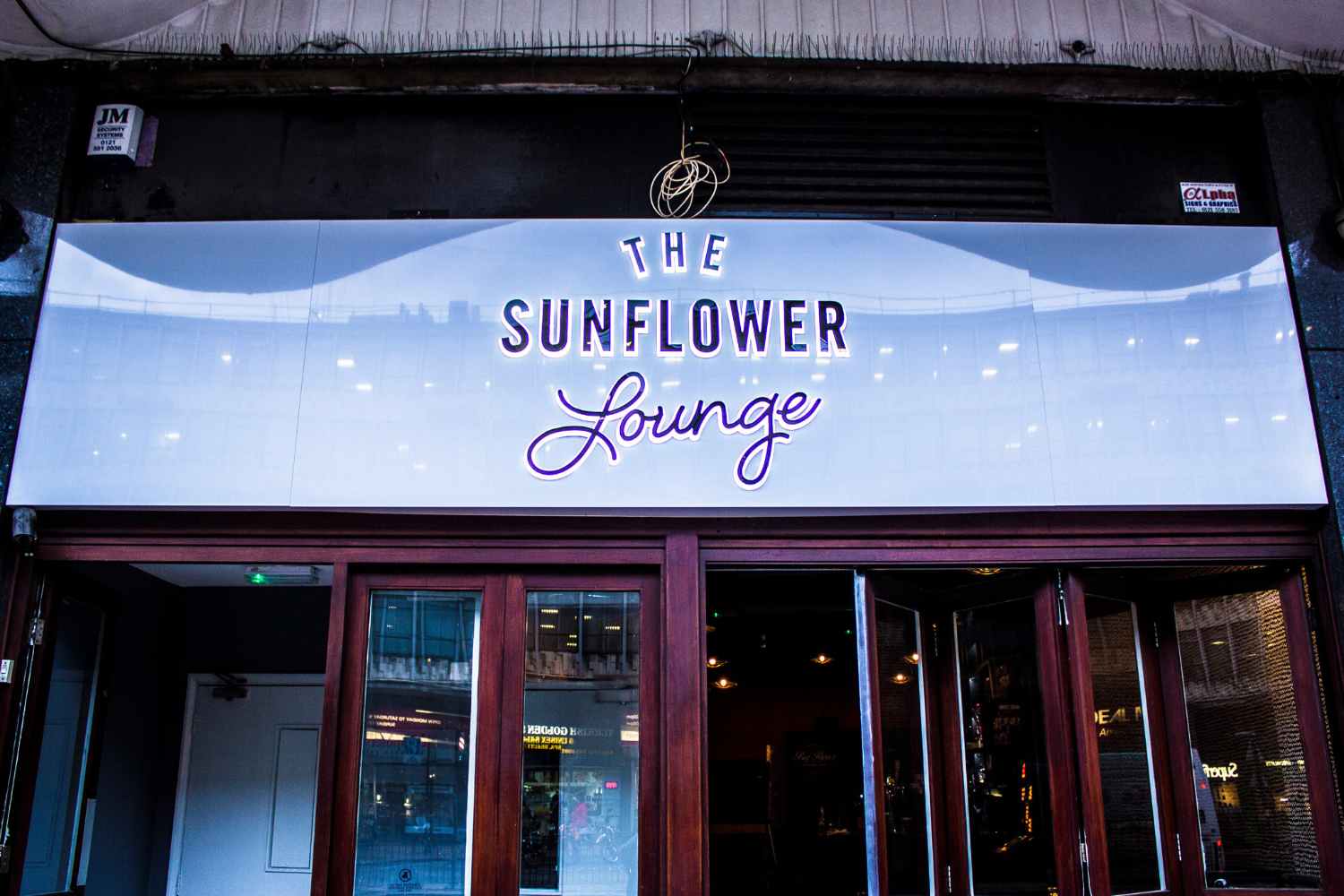 sign-outside-of-the-sunflower-lounge