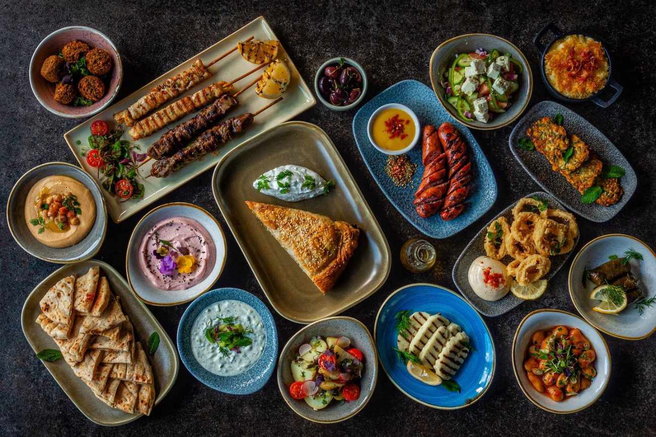bowls-of-greek-food-on-table-at-aquum-bar