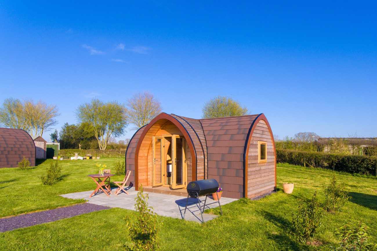 cowslip-glamping-pod-in-field-at-bradley-hall-glamping-cheshire
