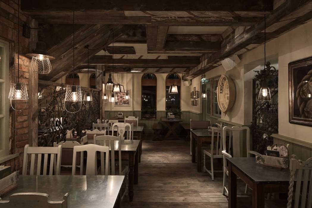 dark-interior-of-the-botanist-bar-with-tables