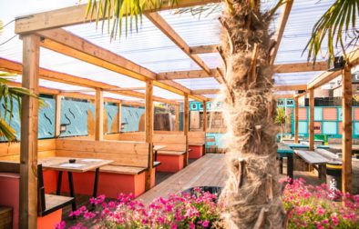 palm-trees-and-outdoor-tables-at-brixton-courtyard-bottomless-brunch-brixton
