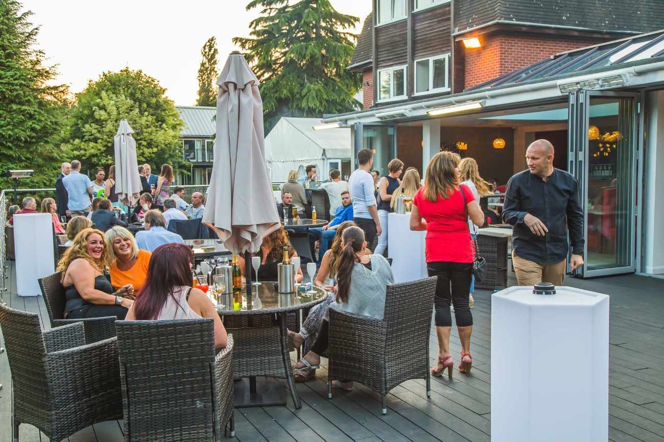 people-drinking-on-terrace-of-the-oak-bar-and-terrace-bottomless-brunch-norwich