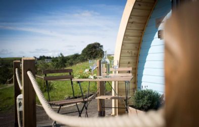 table-and-chairs-on-decking-of-rossendale-holiday-glamping-pod