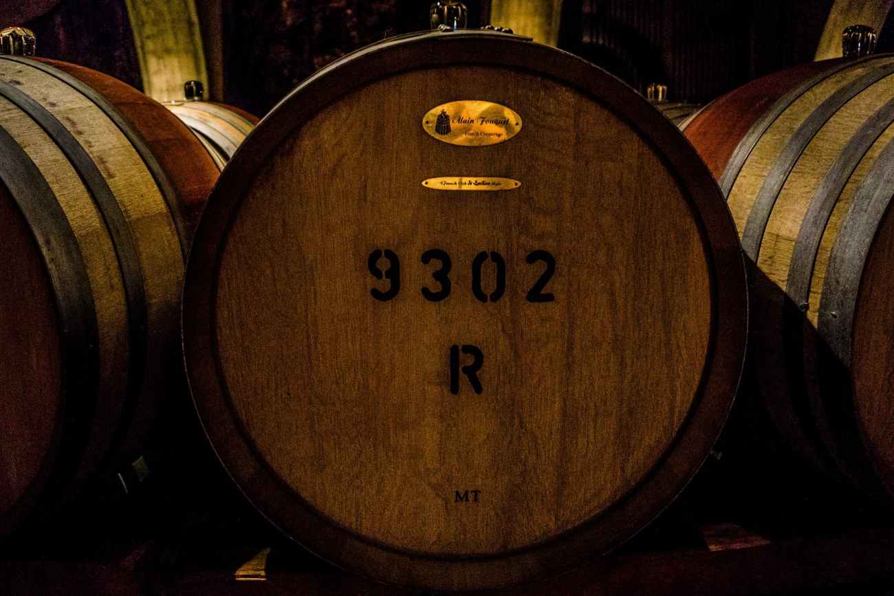 three-wine-barrels-in-dark-room