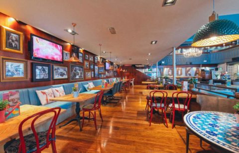 interior-of-revolution-bar-with-restaurant-tables-bottomless-brunch-cheltenham
