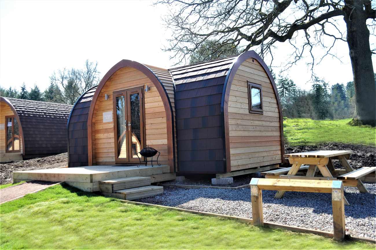 whitemead-forest-park-glamping-pods-with-outdoor-seating