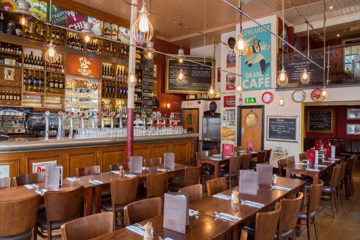 bar-and-tables-inside-lowlander-grand-cafe