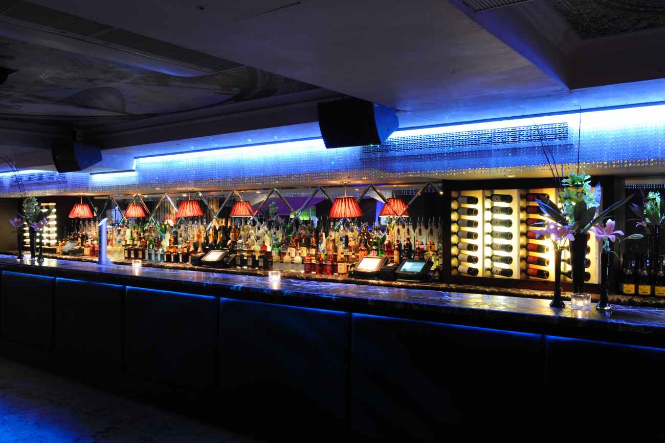 bar-lit-up-in-colours-at-night-at-ruby-blue
