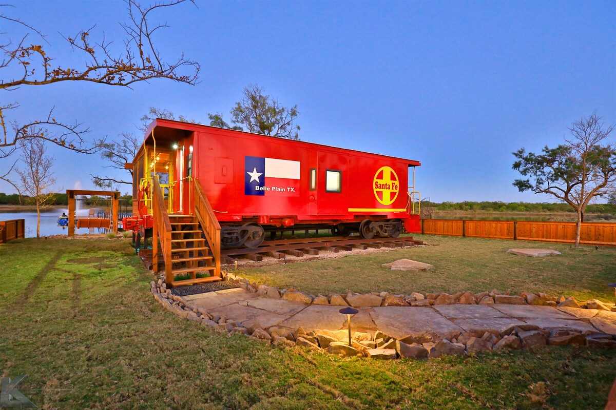 the-belle-plain-caboose-train-at-sunset-glamping-texas