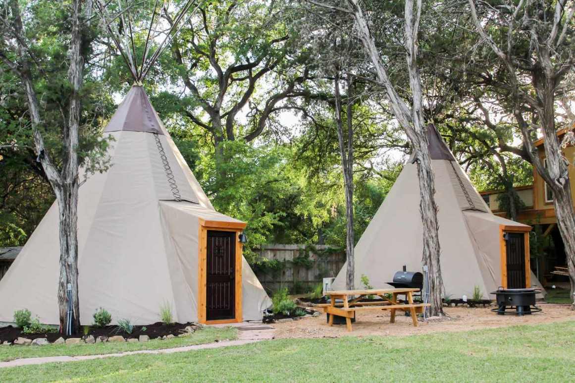 two-tipis-on-the-guadalupe-in-field