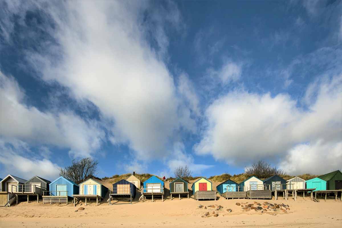 colourful-beach-huts-in-abersoch-beaches-in-liverpool
