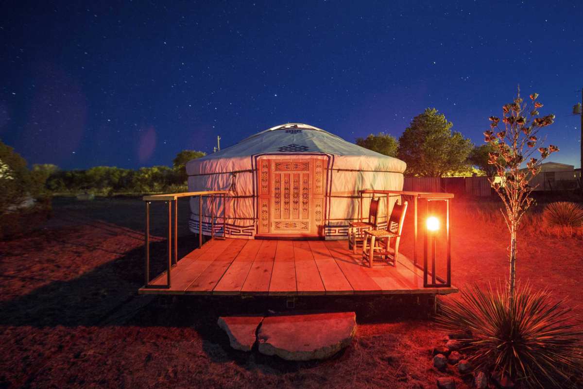 exterior-of-el-cosmico-yurt-at-night-yurts-texas