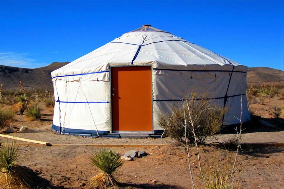 exterior-of-el-paso-yurt-on-sunny-day-in-desert