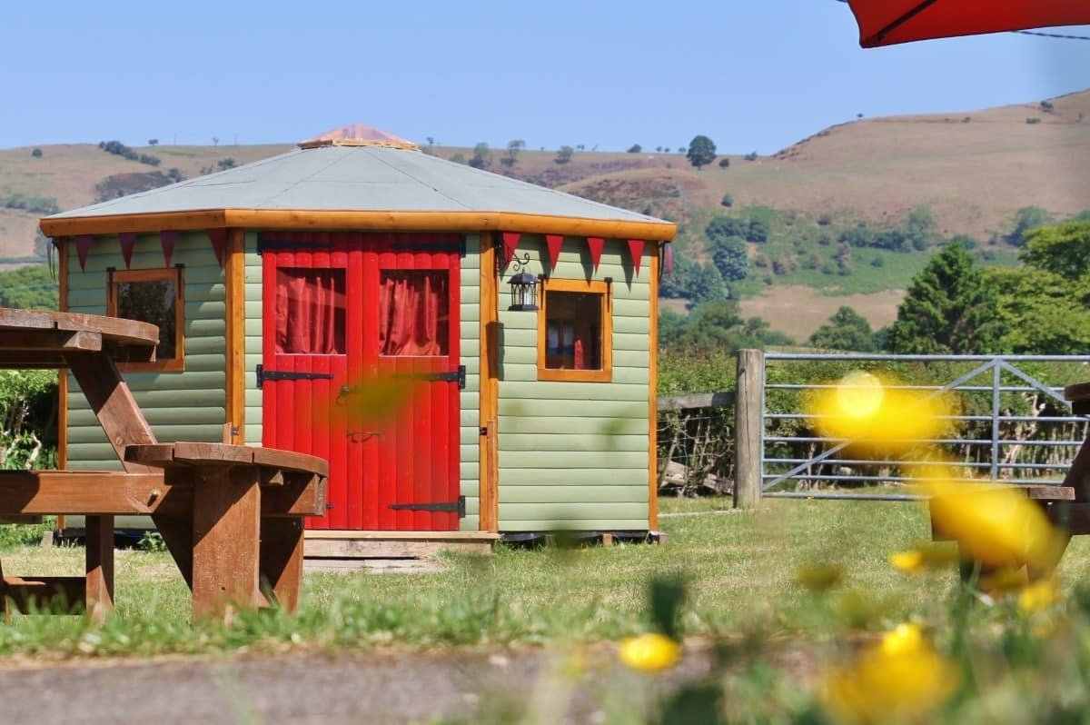 exterior-of-yurt-carianne-in-field-yurts-north-wales