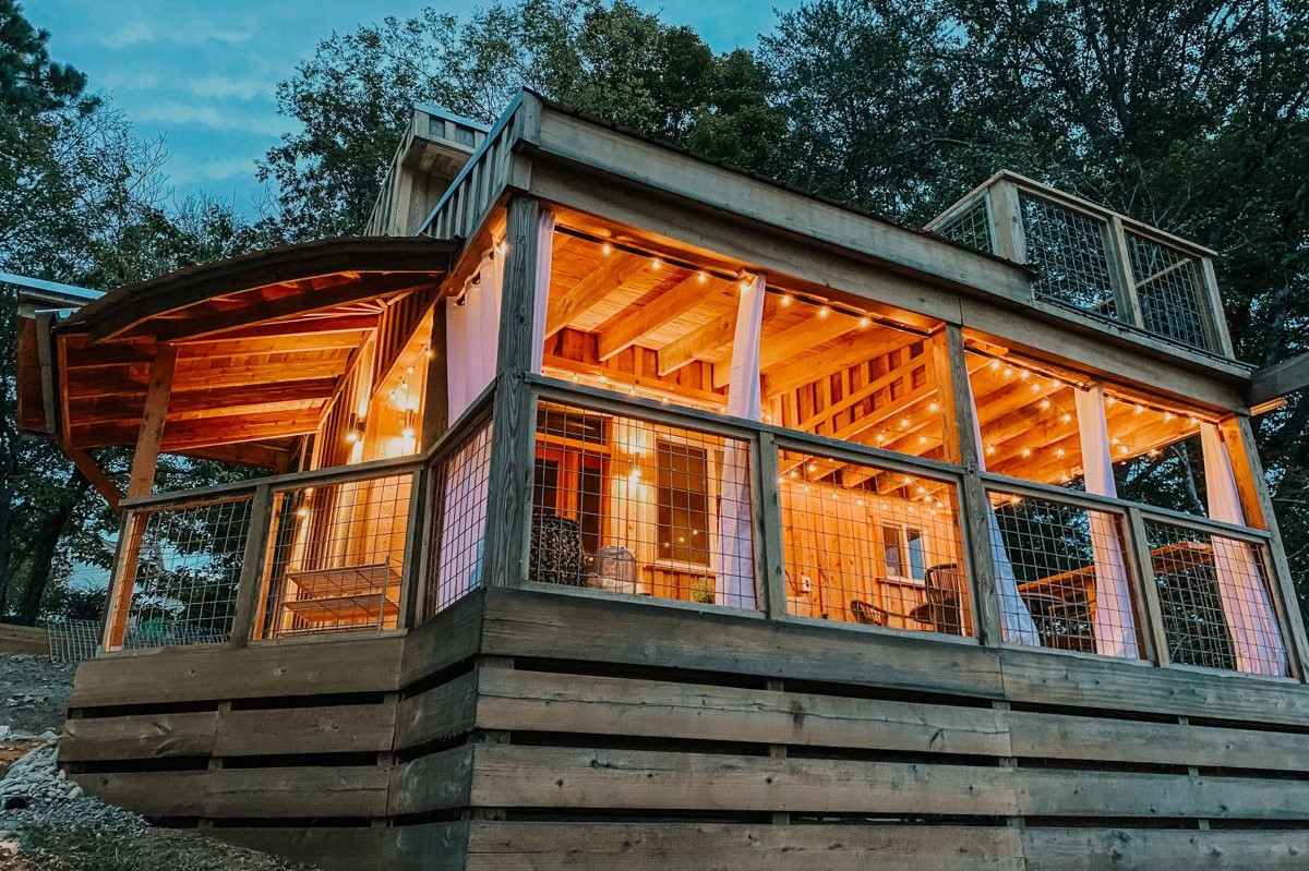 little-river-tiny-house-lit-up-at-night-glamping-tennessee