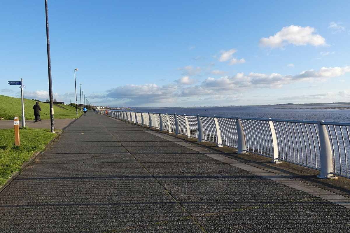 otterspool-promenade-by-water-on-sunny-day