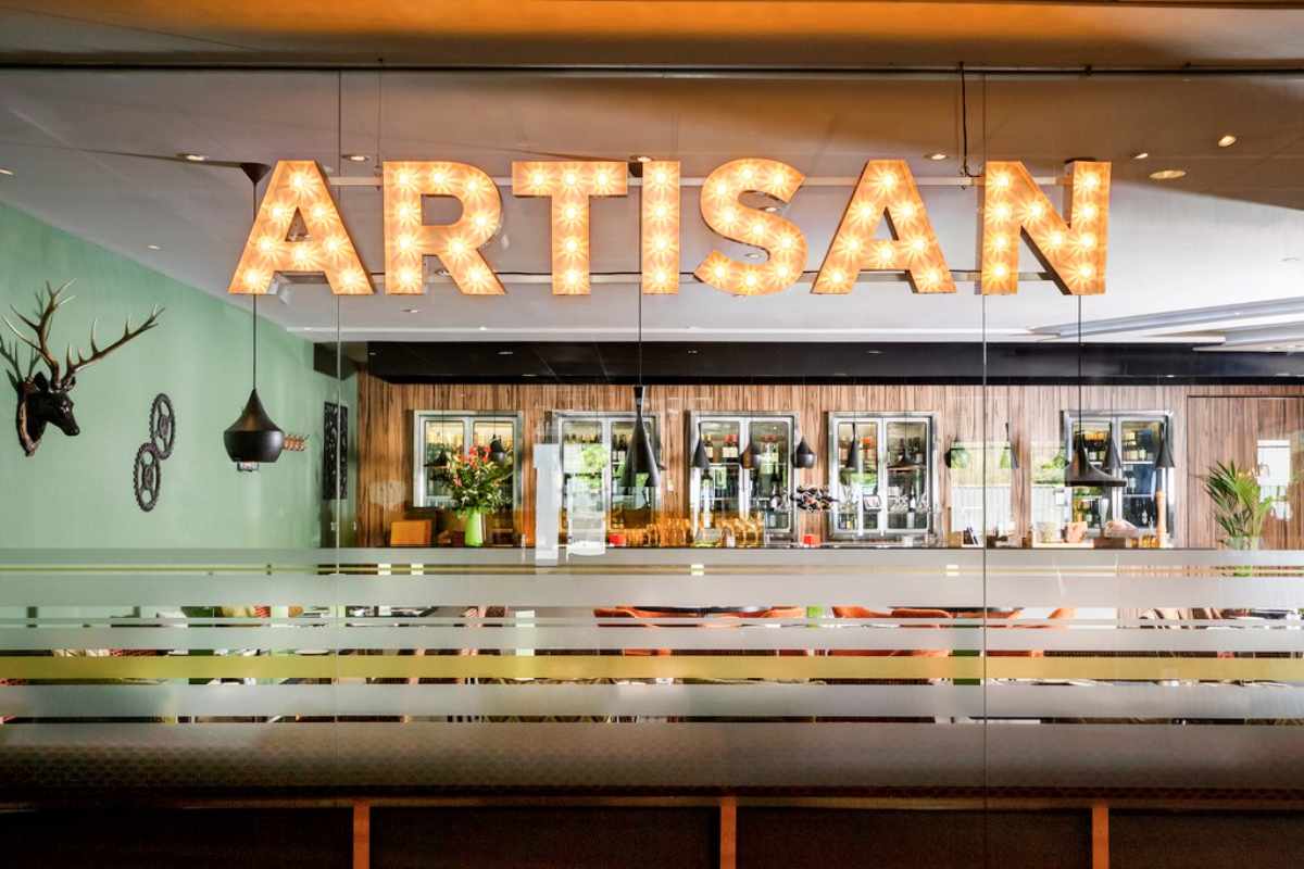 artisan-sign-on-wall-of-restaurant
