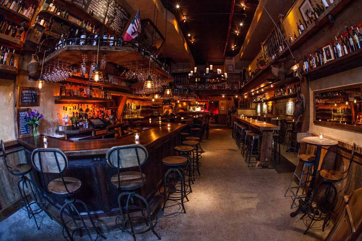 bar-and-tables-inside-dark-carroll-place-restaurant