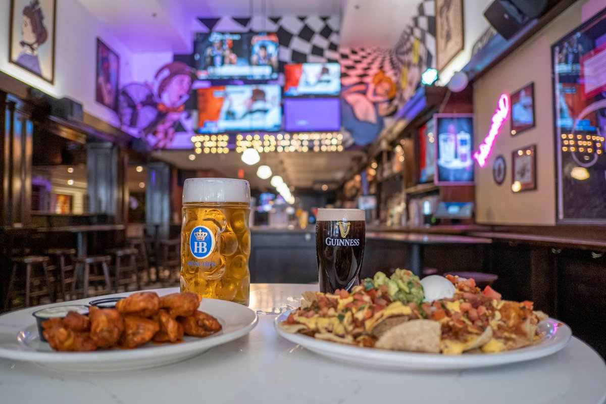 pints-and-plates-of-food-at-madhatter-restaurant