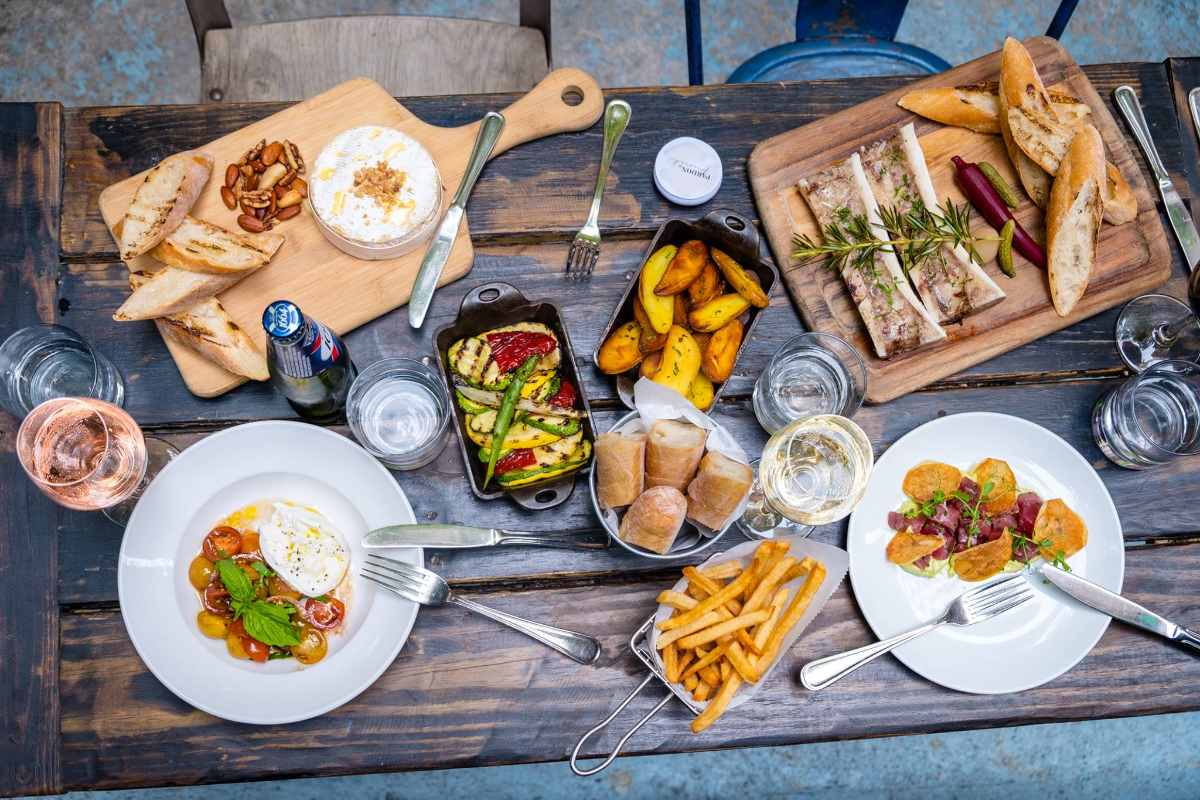 plates-of-food-on-table-of-pardon-my-french-restaurant