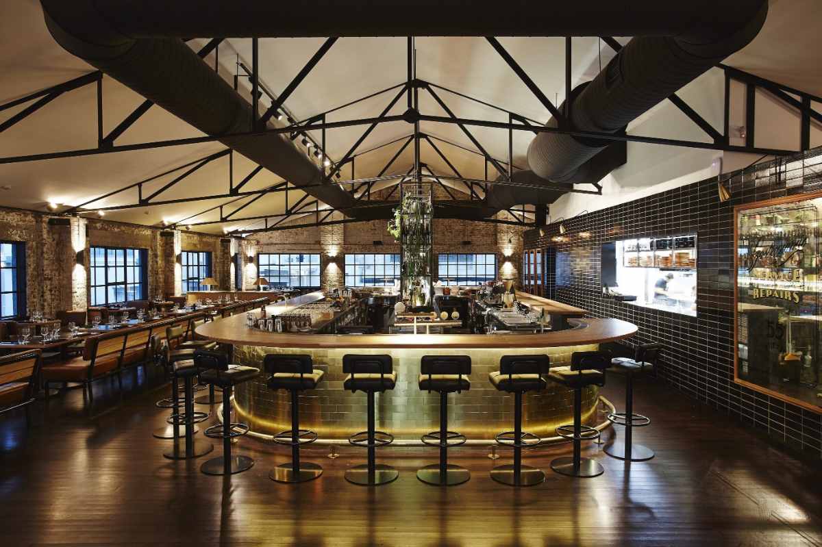 bar-tables-and-kitchen-inside-riley-st-garage
