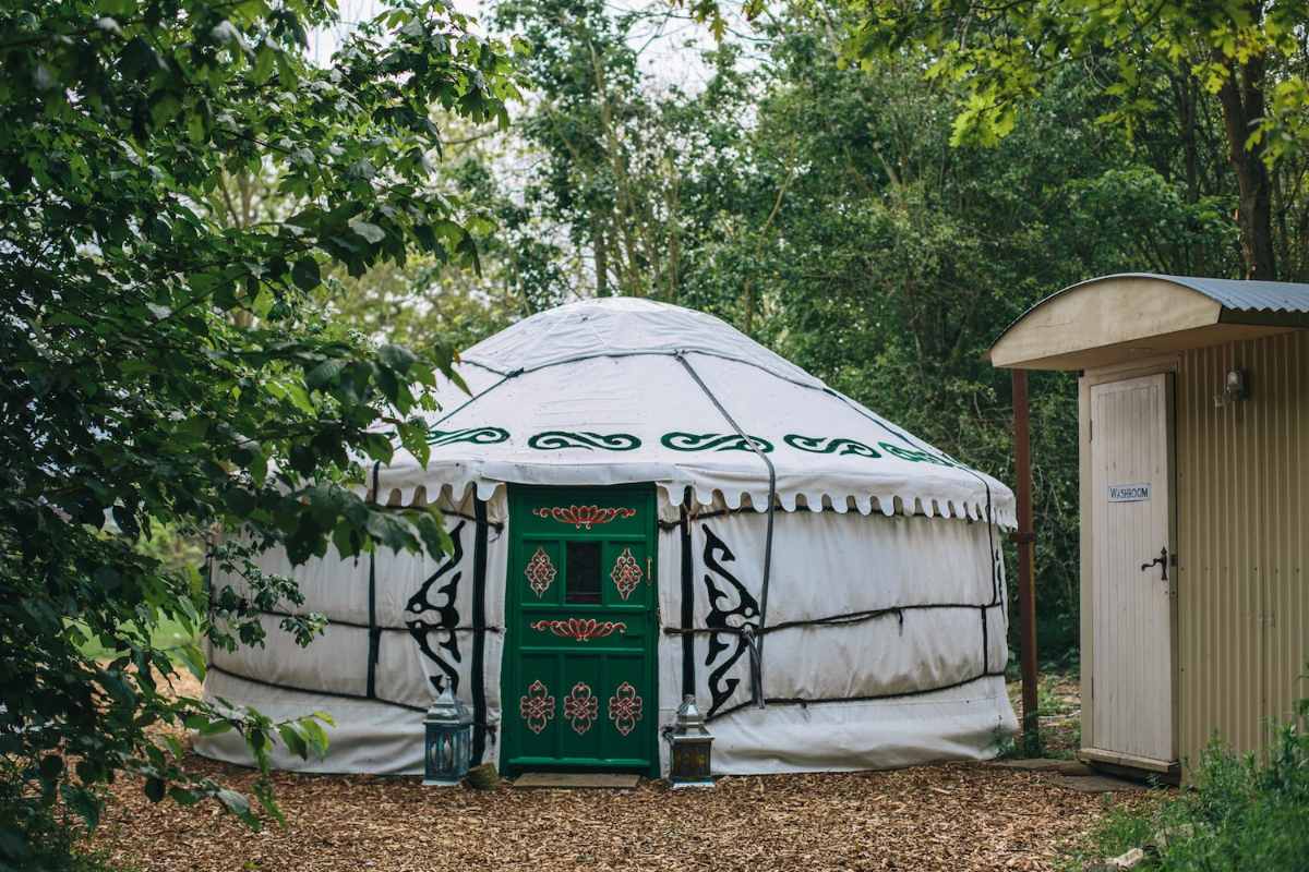mongolian-yurt-surrounded-by-trees-at-kenton-hall-estate