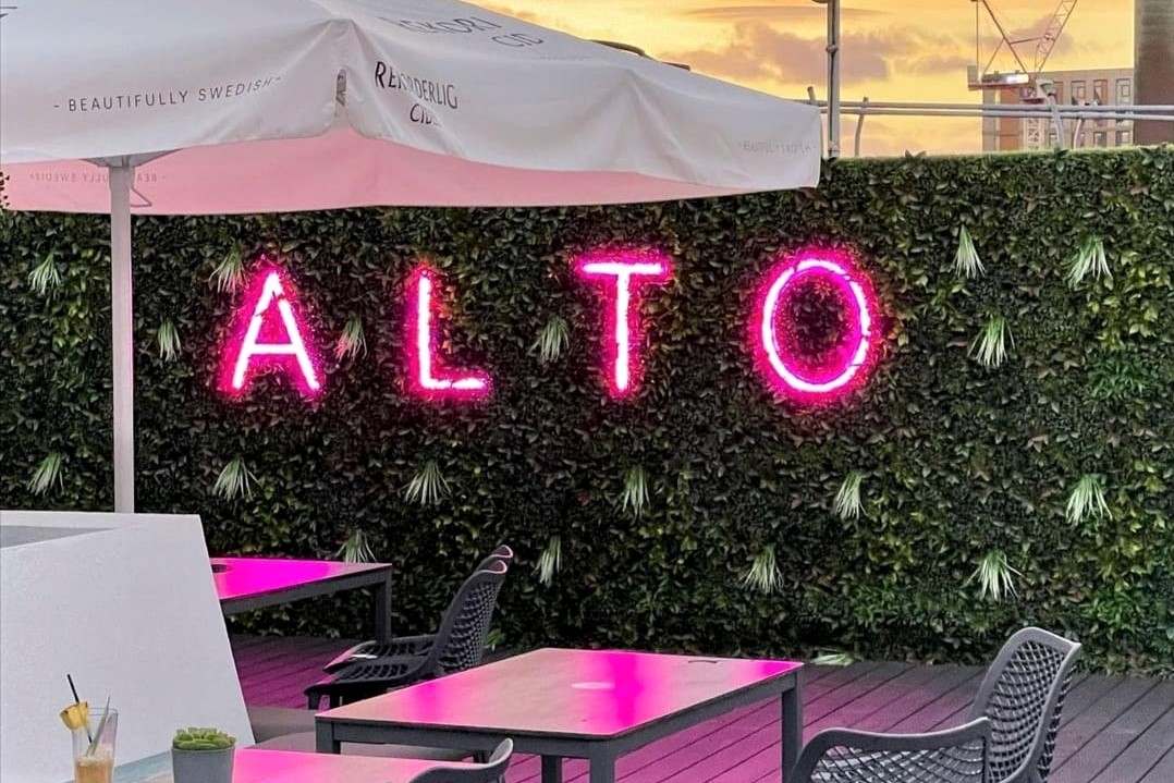 neon-pink-alto-sign-on-rooftop-bar