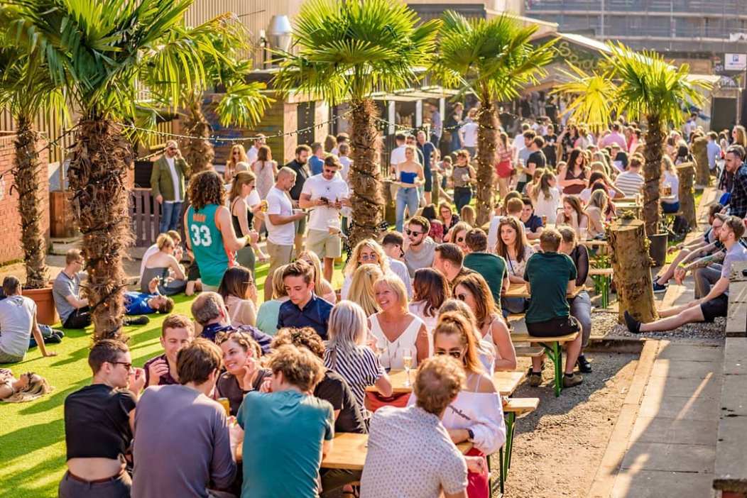 people-drinking-in-sunshine-at-birdies-bar-and-bbq-bottomless-brunch-liverpool
