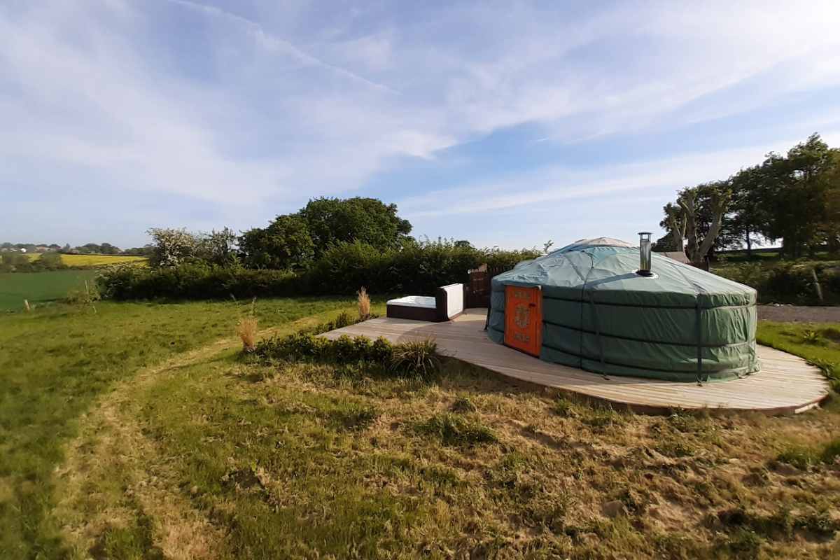 remote-isolated-yurt-on-decking-in-field