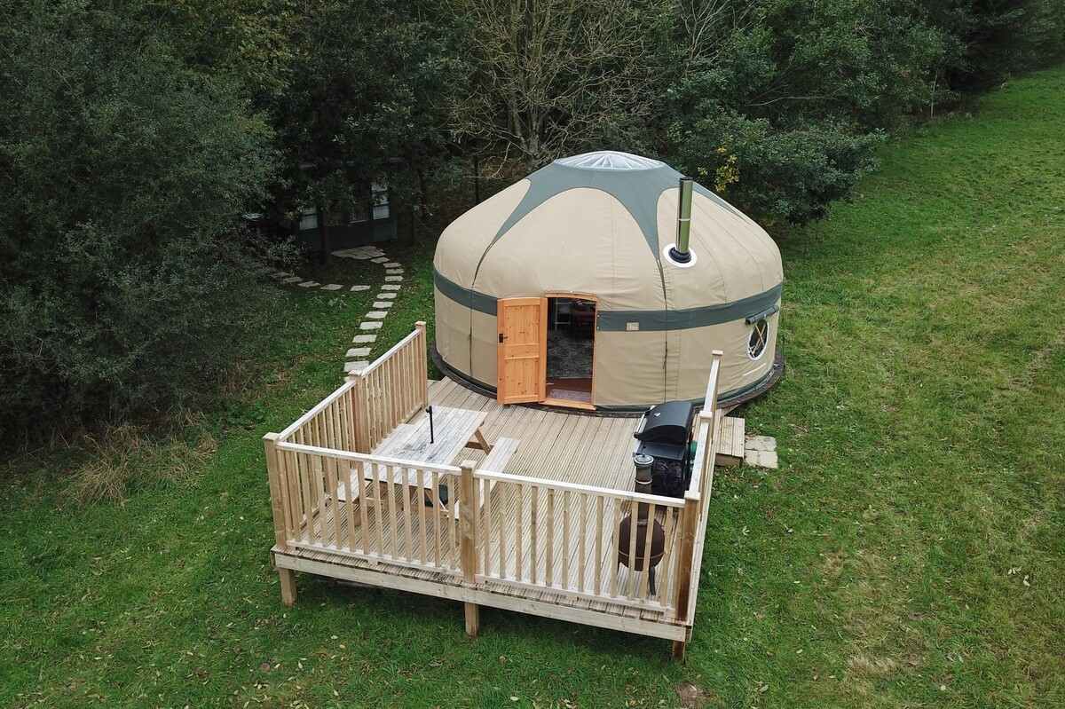 aerial-view-of-lake-view-yurt-in-field-glamping-wiltshire