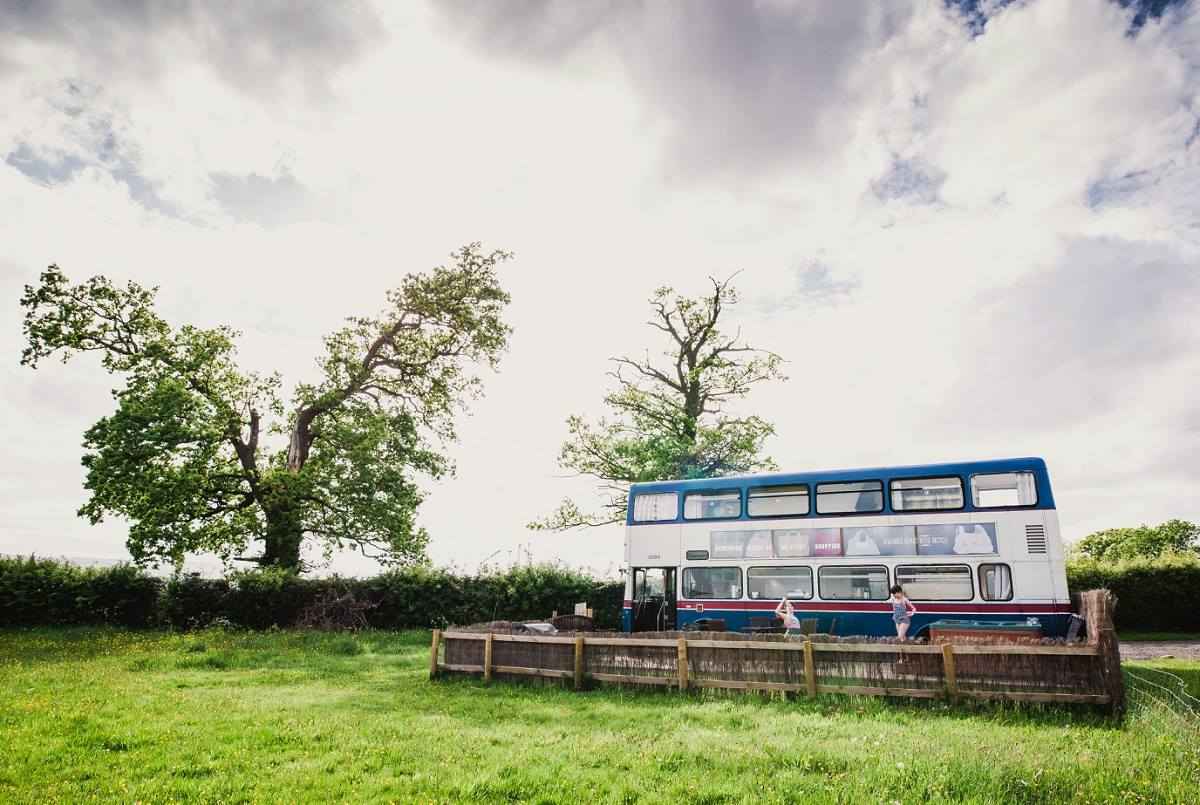 betsy-blue-bus-in-field-at-pigeon-door-glamping