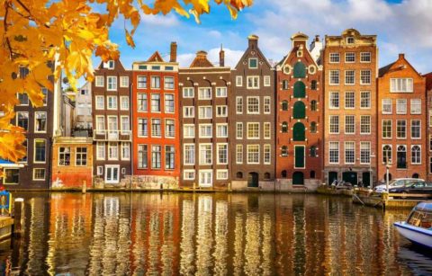 buildings-reflected-in-water-autumn-in-amsterdam